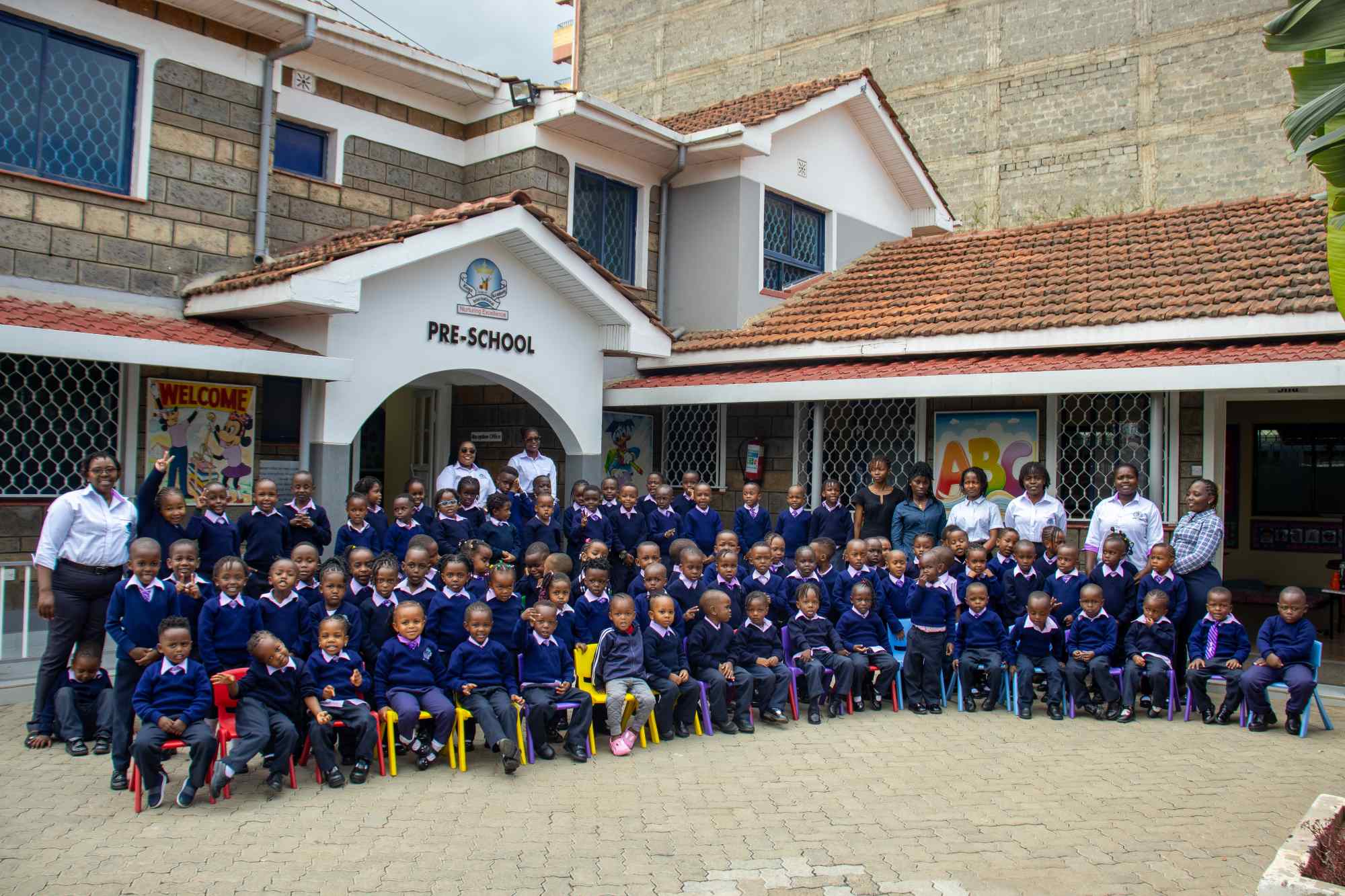 kings international academy pre school group photo with learners and teachers