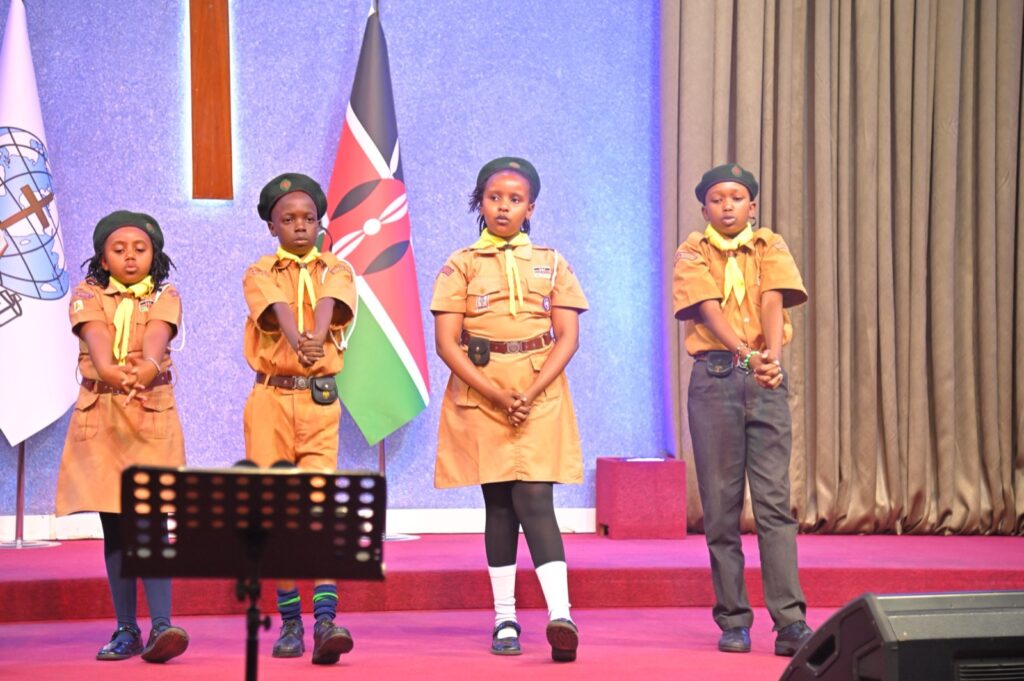 Scouts on stage at the start of Kings International Academy Graduation 2026