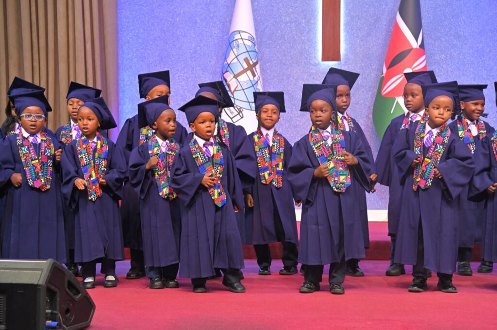 PP2 class of 2026 on stage at Kings International Academy