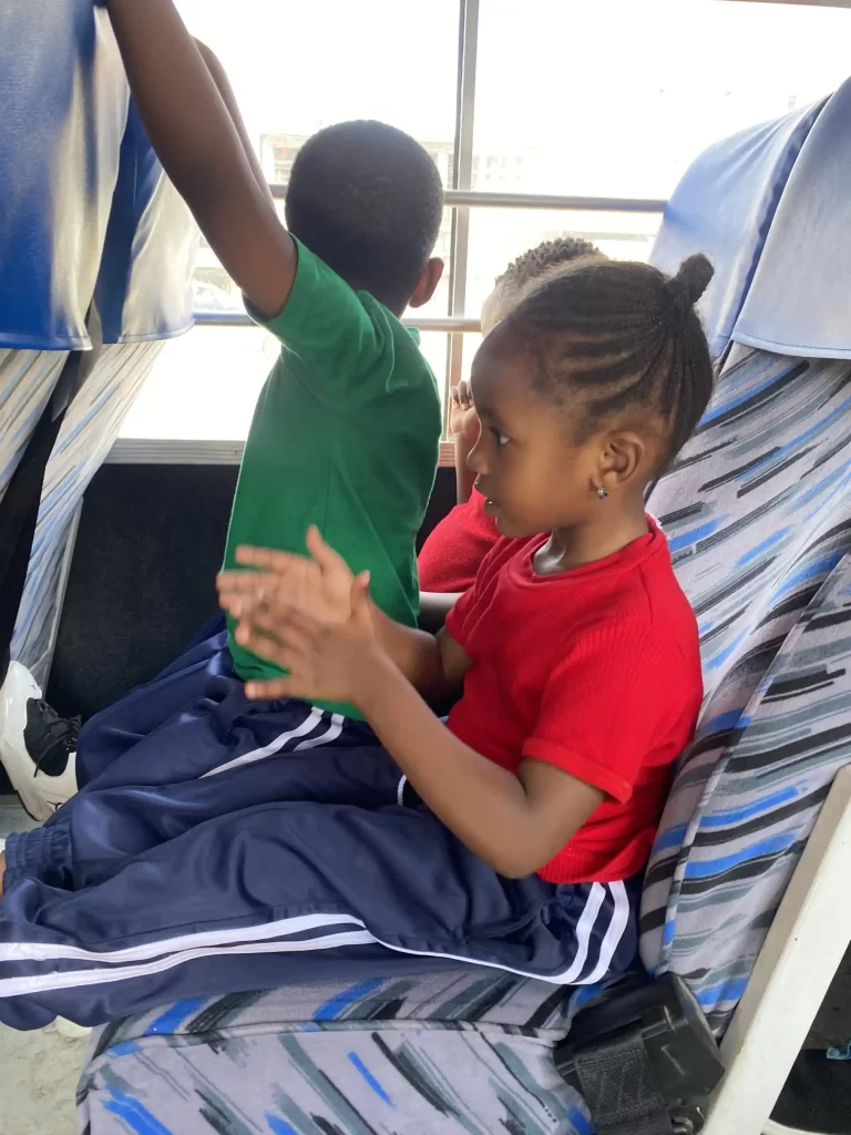 Kings International Academy preschool children on the school bus